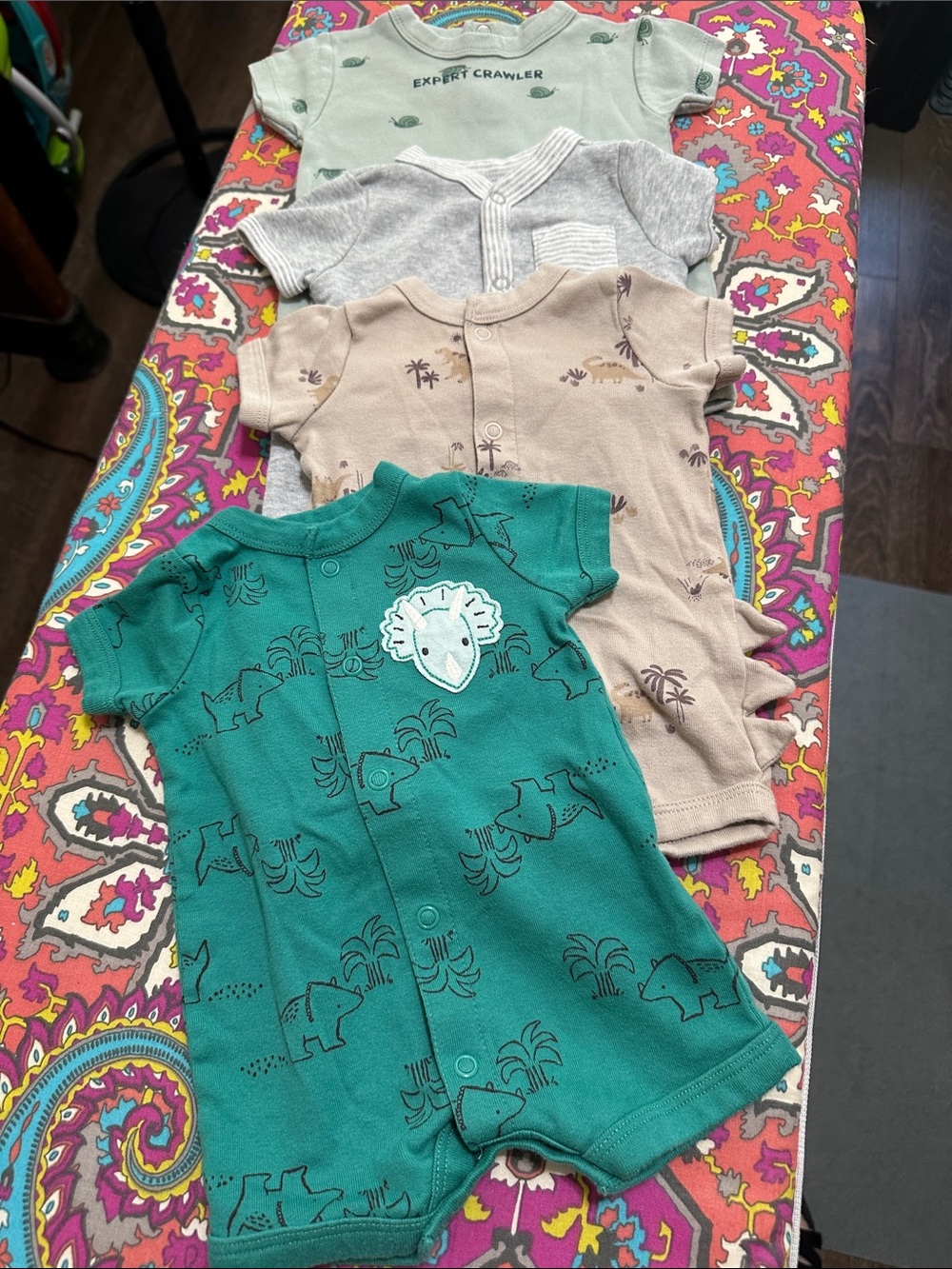 4 pc Carter's Baby One-Piece Bodysuits (NB)